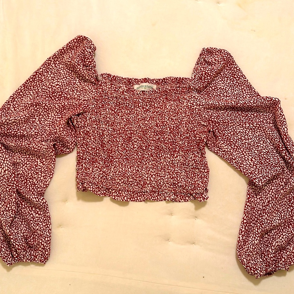 Women’s crop blouse.  Size larger. Silky material. Gathered sleeves and bodice.
